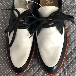 Black and white spectator shoes